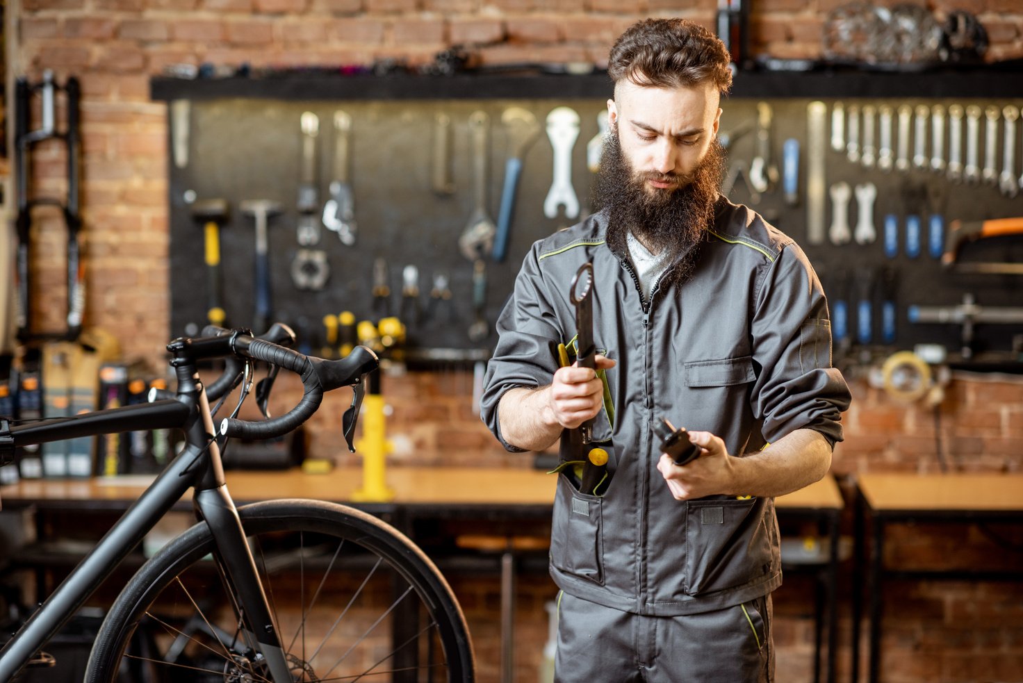 Bicycle Service Worker at the Workshop