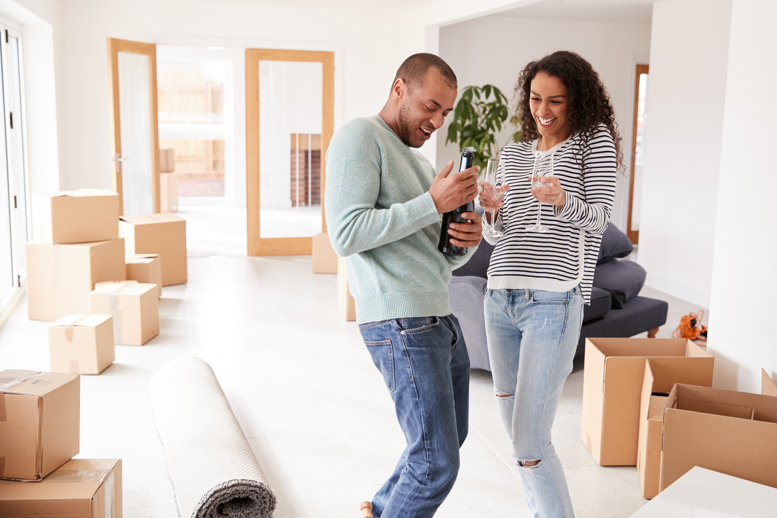 Couple Celebrating Moving into New Home